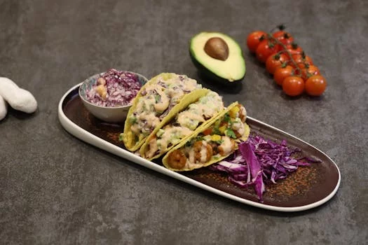 fish tacos with cabbage slaw and chipotle sauce