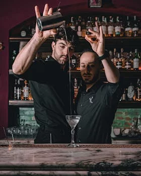 experienced bartender crafting cocktails